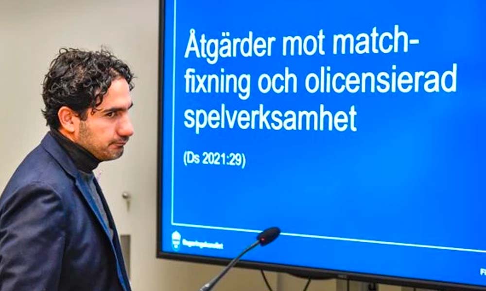 Betalningsblockering: ett krafttag mot olicenserade casinon 1 Man i affärskläder presenterar en bild om åtgärder mot uppgjorda matcher, olicensierade spelaktiviteter och betalningsblockering.